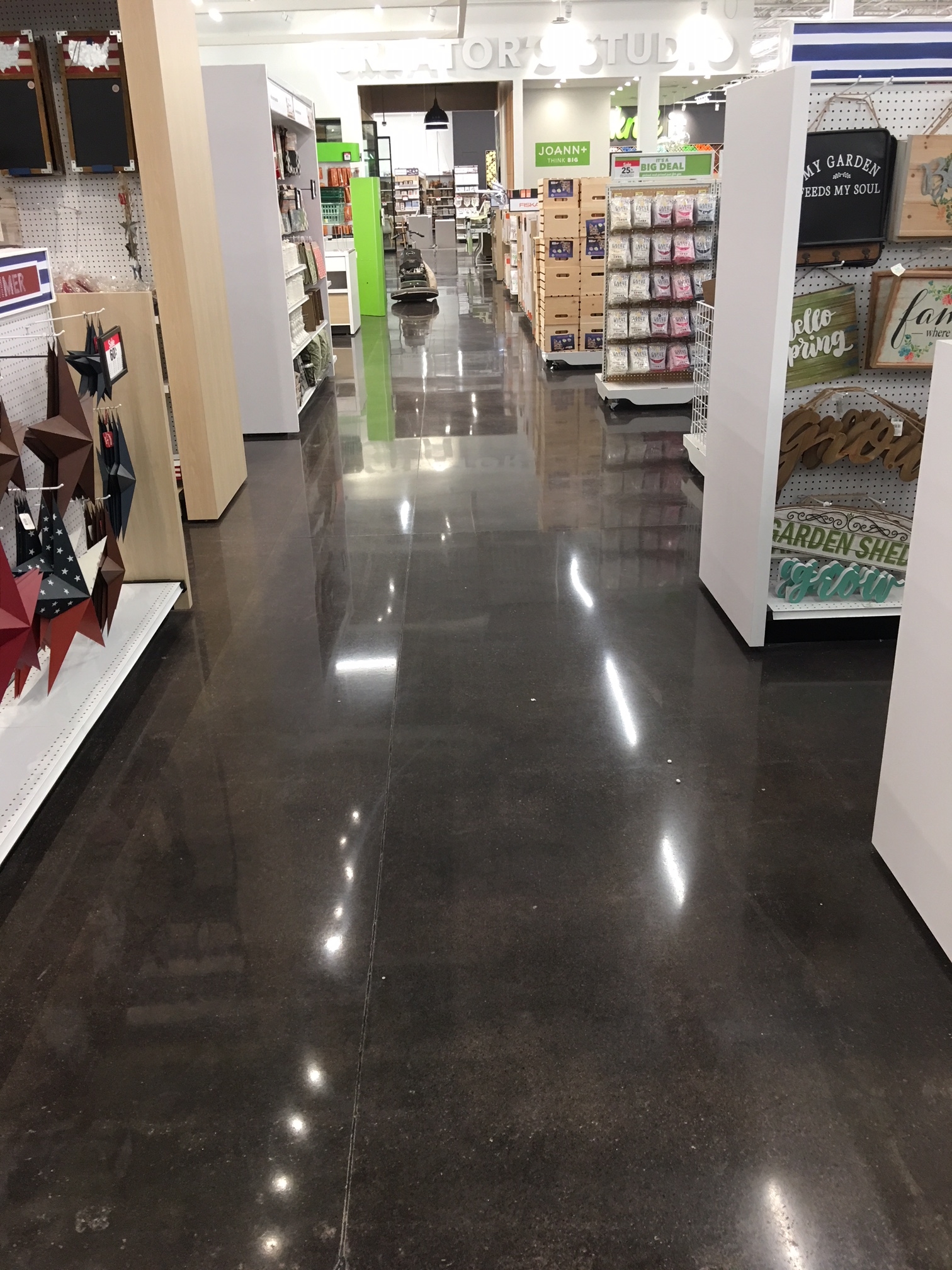A polished concrete aisle in a store.